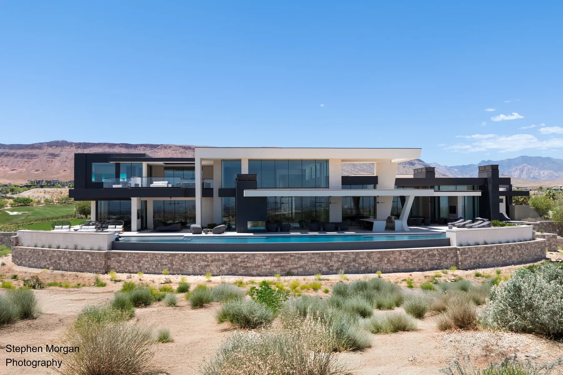 Summit Club residence in Summerlin, floor-to-ceiling glass over the pool and fairway